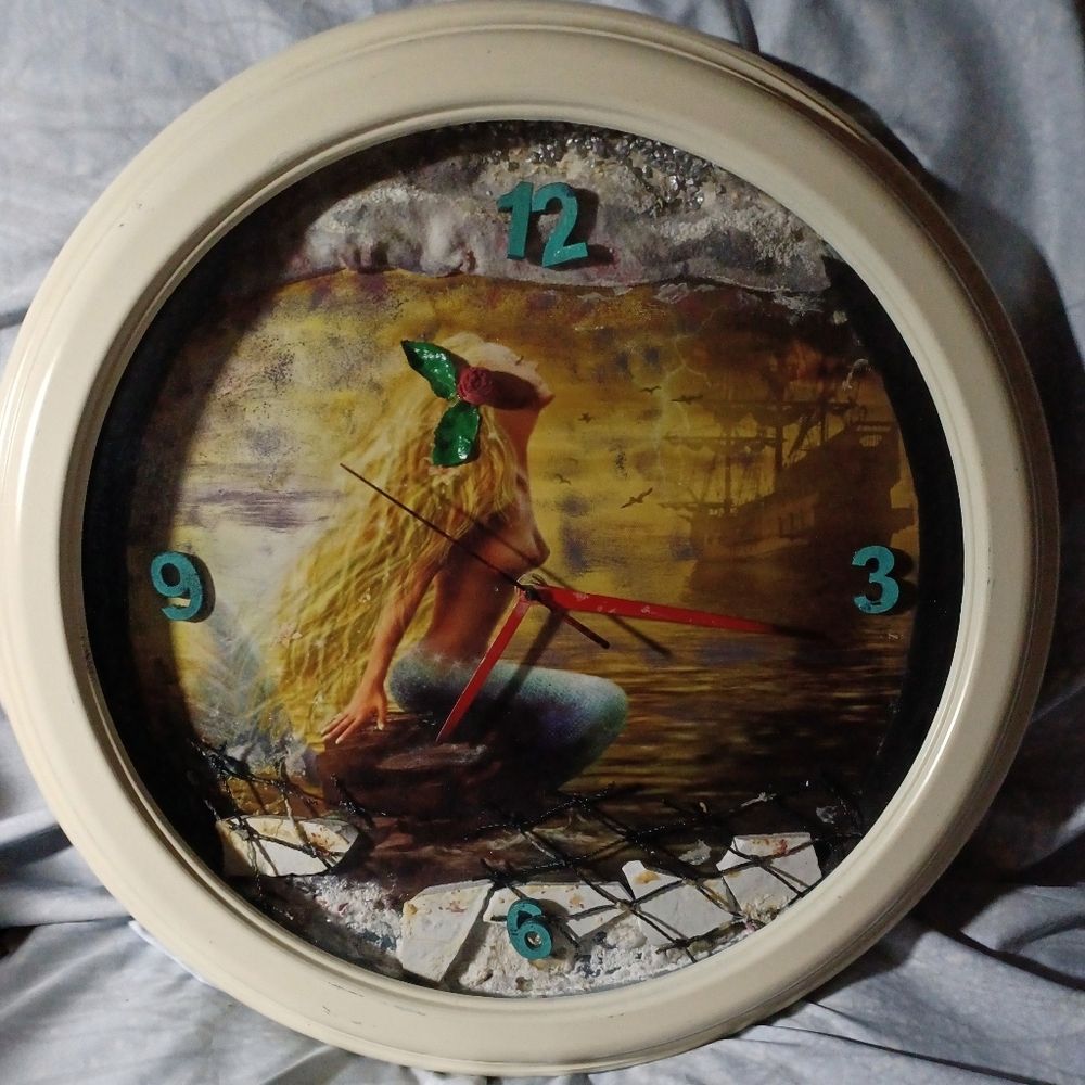 Handmade mermaid wall clock in cased in glass